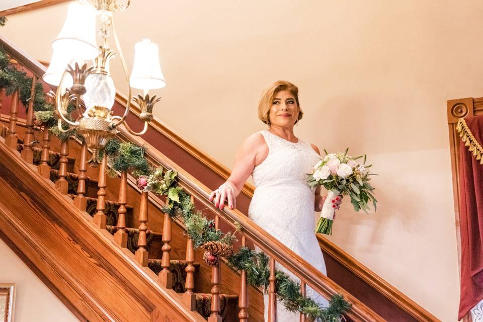 Bride walking  down the stairs
