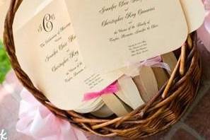 Programs made into fans for outdoor wedding