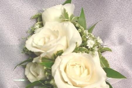 Corsages and boutonnieres add a beautiful  touch to any special occasion.  We can make the traditional corsage or make it more modern by adding bangles and beads.