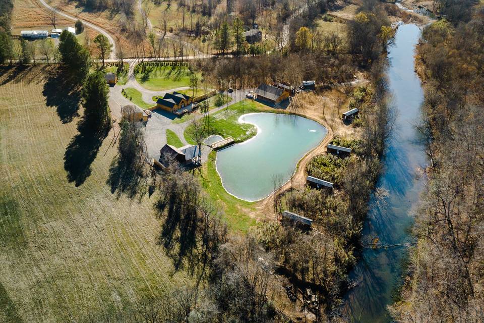 Drone shot of Creek & Cabins