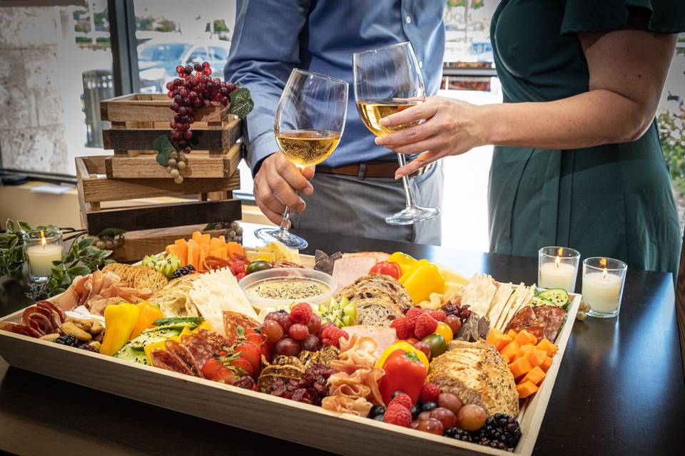 Celebrate with wine & a board!
