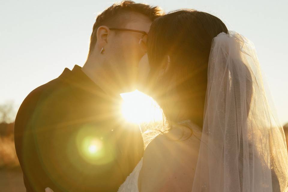 Cait P. PhotogBride and groom