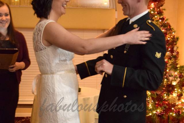 Casey & Alexis go in for the kiss at their Christmas wedding at Danfords*Photo courtesy of Fabulous Photos