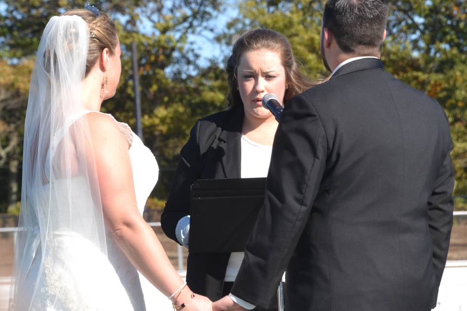 Chris (a huge Sachem fan) and Theresa were married on the 50 yard line of the Sachem North Football field! It doesn't get more unique than this, Go Arrows!