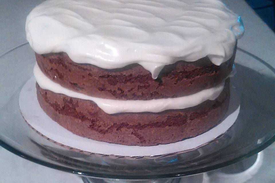 Apple Spice Cake. Made with fresh apples, raisins and spices. Cream cheese frosting.