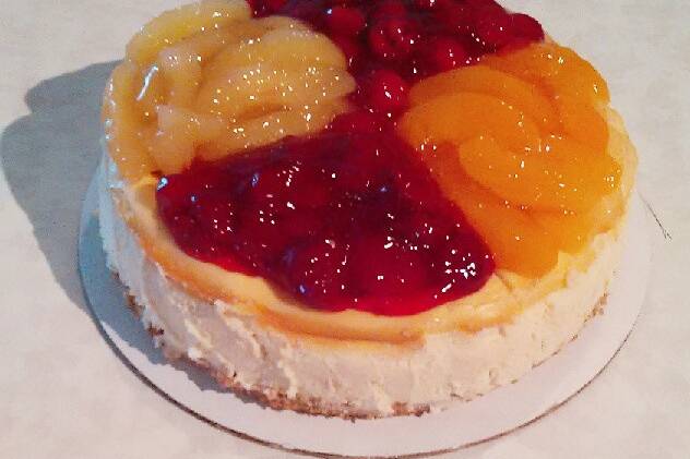 The Quartered Cheesecake. Topped with four of your favorite fruit toppings.