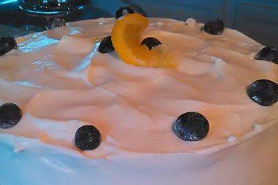 The Sunshine Cake. Made with blueberries and lemons. Whipped cream frosting.