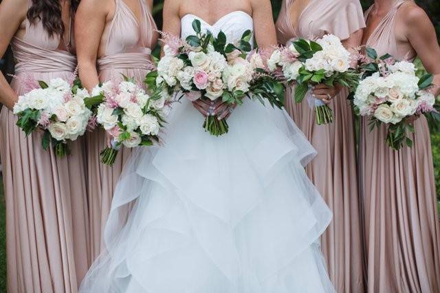 Soft romantic bouquets in white, ivory and blush.