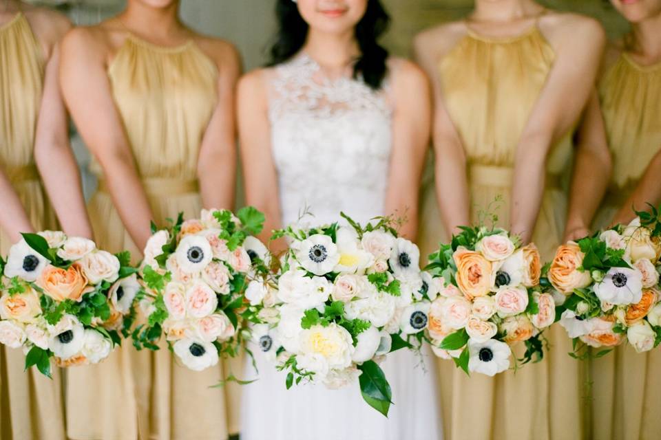 Soft yellow, orange and peach bouquets.