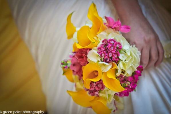 Yellow, white and pink brides bouquet with callas, stock, sweet william and more.