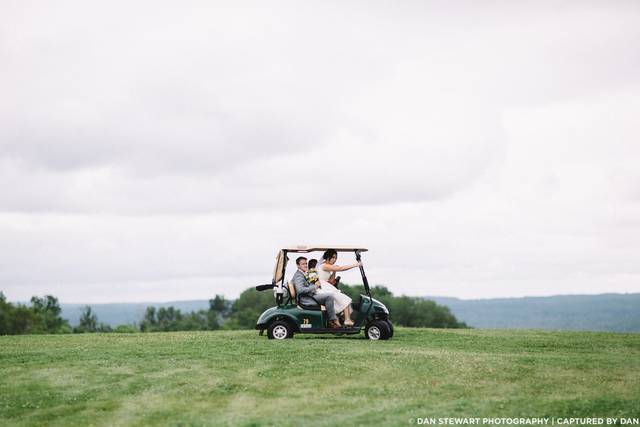 Couple on golf cart