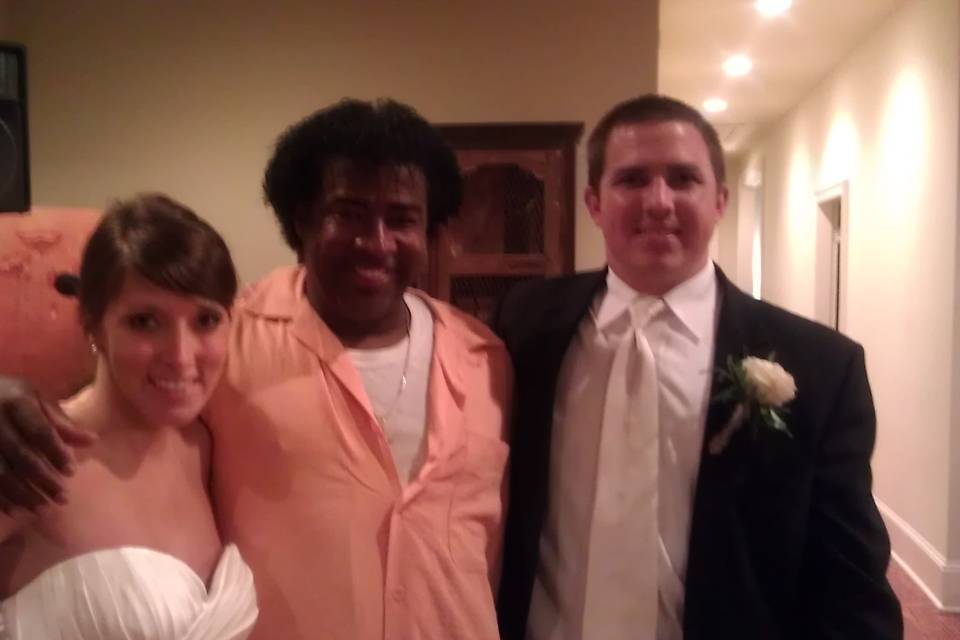Bride, musician, and groom