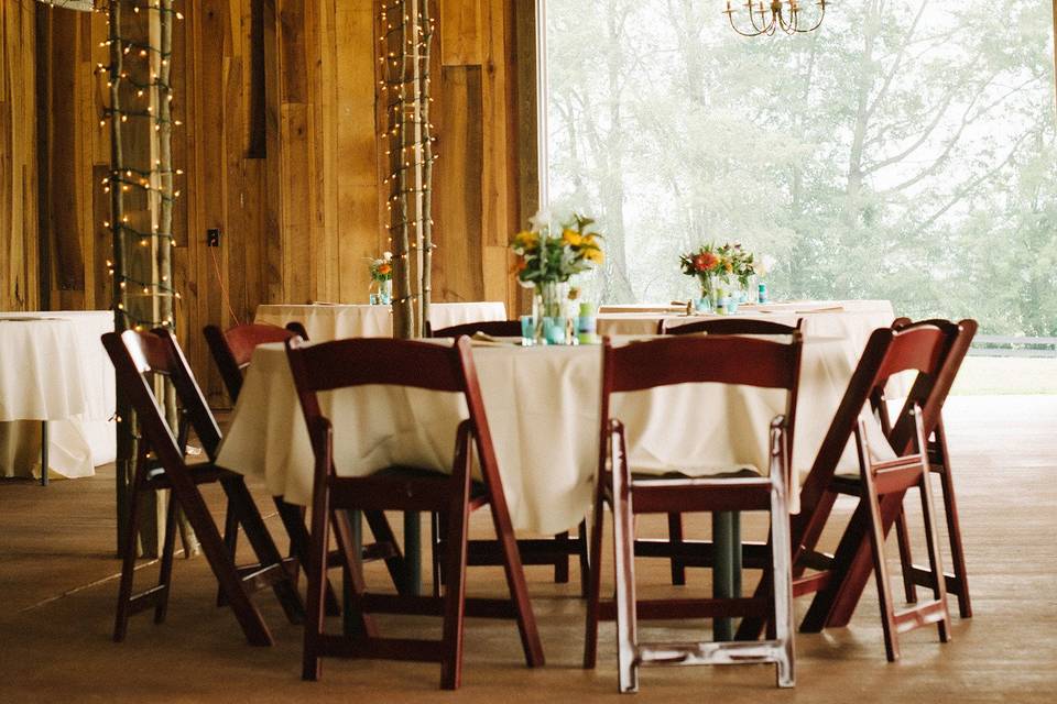 Round table with red chairs