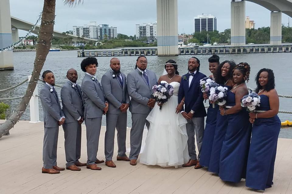 Newlyweds, bridesmaids, and groomsmen