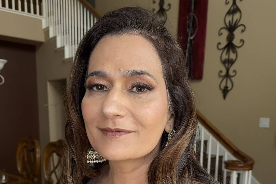 Party makeup with basic curls