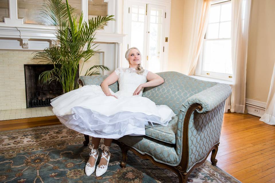 Bride gazing through the window