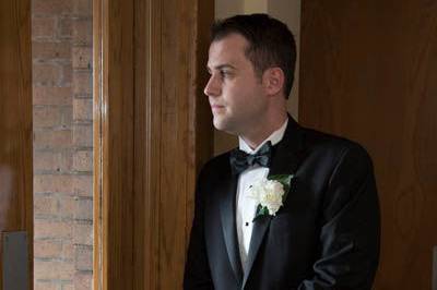 Groom portrait with window light.