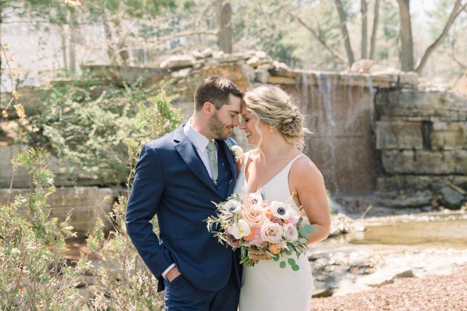 Couple by the waterfall