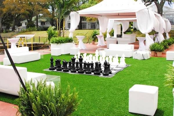 Looking for something completely different? This outdoor reception features our High Peak Tents, Modular White Seating Collection, and a bit of whimsical fun!