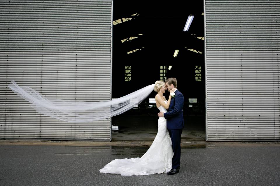 The breeze catches her veil