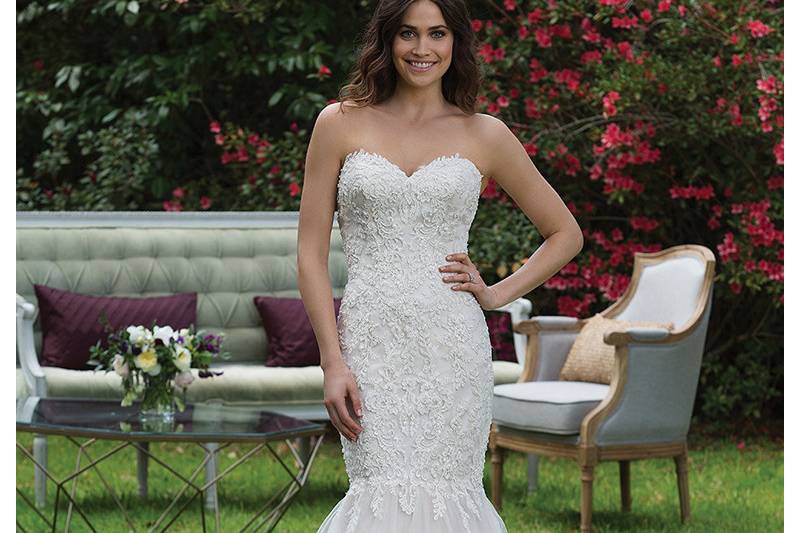 3944 <br> Show off your figure in this tulle mermaid gown with a sweetheart neckline, dropped waistline, and beaded lace appliques. Matching popover jacket available separately as style 3944J.
