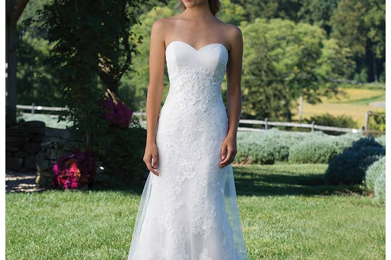 Style 3979	<br>	Empire Waistline with Tulle Cage Overlay on Fit and Flare Gown