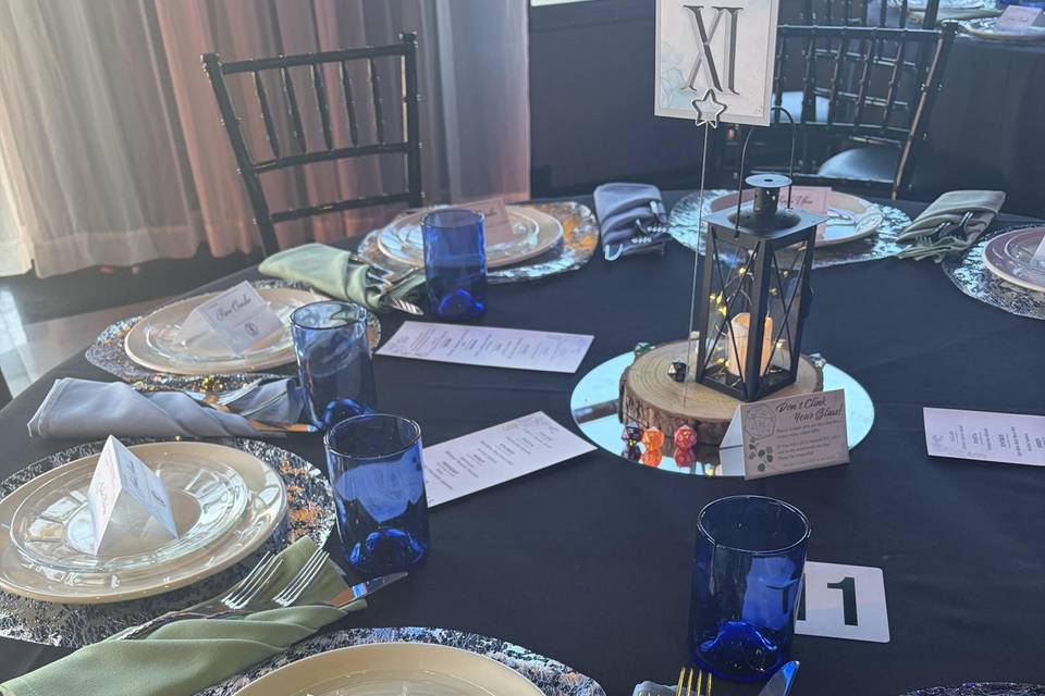 Tables set with favors/napkins