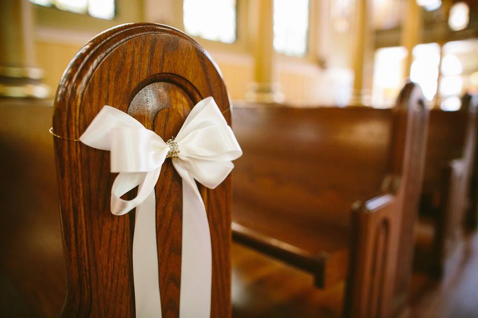 Classic pew marker at St. Cecilia's, Boston.  Photo by Shane Godfrey Photography.