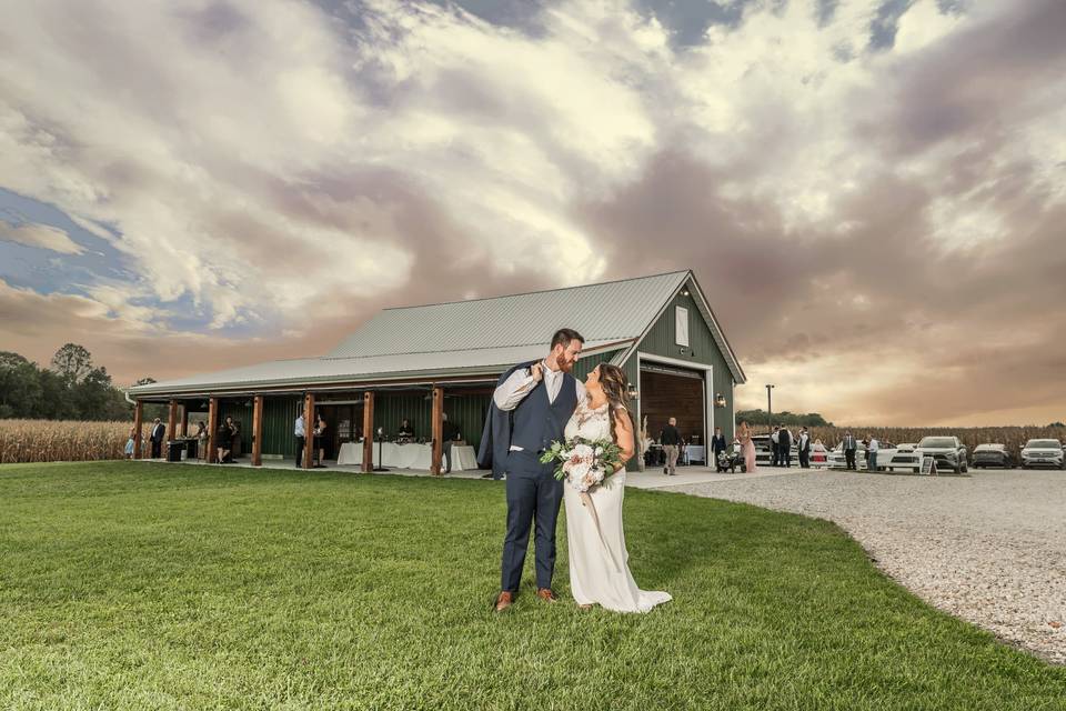 Couple and barn