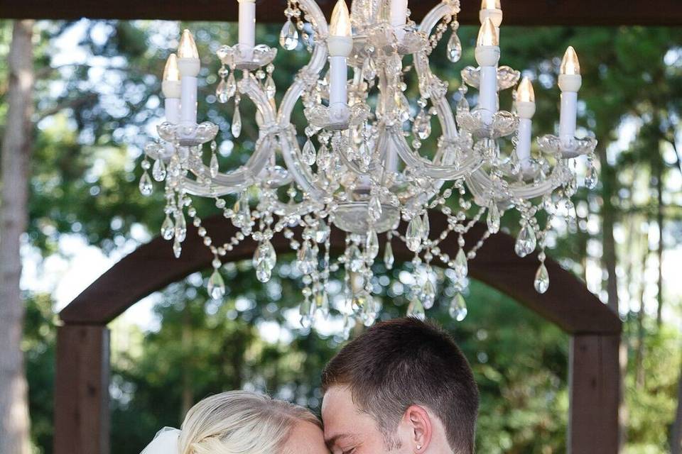 Brides bouquet using coral roses, hydrangea, lisianthus, dusty millerFlowers by Exotica the signature of flowers Photos by C. Baron PhotographyVenue at Crystal Springs