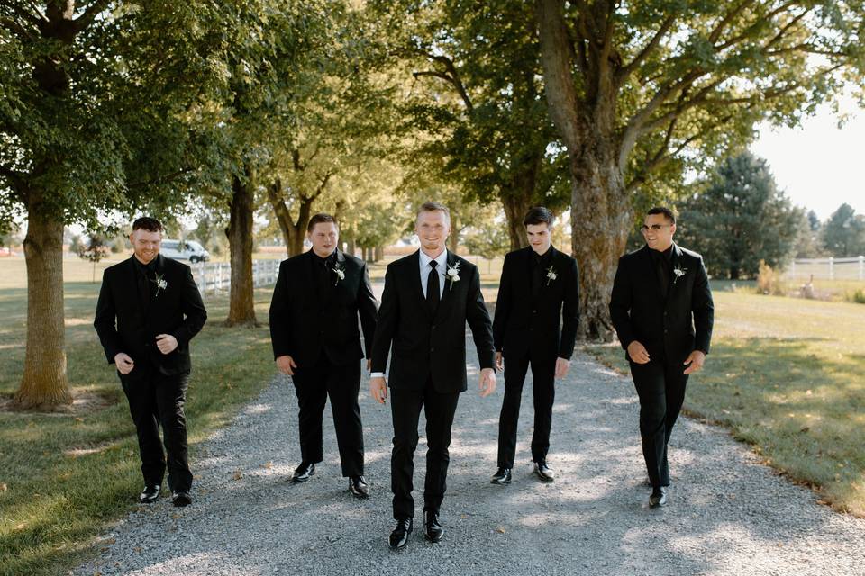 Groomsmen in lane