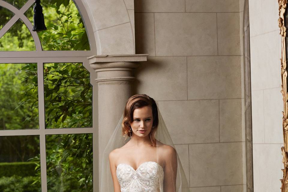 Style 14414 Virginia <br> This sophisticated, shimmer taffeta ballgown features a sweetheart neckline, dramatic asymmetrical side ruching, covered buttons and crystal beaded belt (included). Belt also sold separately as style 14902. Chapel train.