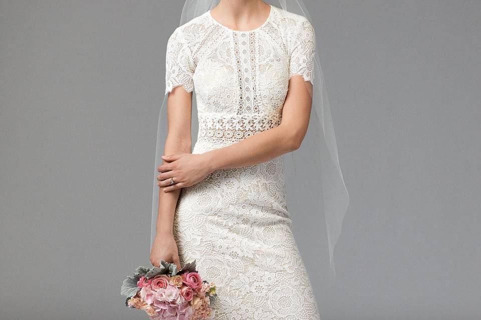 Alma 1013	<br>	Alma is classic romance with a modern twist. Baroque Lace is thoughtfully-placed on top of Lattice Lace to flatter and contour the body. Its off-the-shoulder neckline is highly-trending in both ready-to-wear and bridal fashion, keeping her at the forefront of style. Chapel Train.