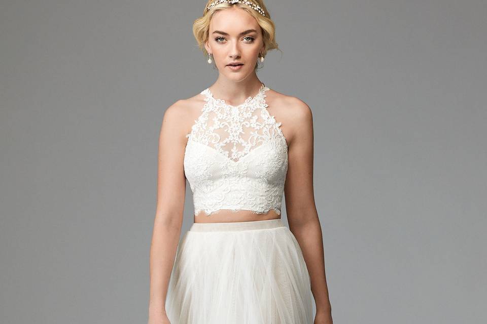 Twilla 57114	<br>	For the modern boho bride, look no further than our Twilla gown. Made of Zuzu Stretch Lace, this style is the perfect blend of soft and structured. Twilla features a Queen Anne neckline and keyhole back, and is trimmed with Grosgrain Ribbon detailing. Puddle Train.