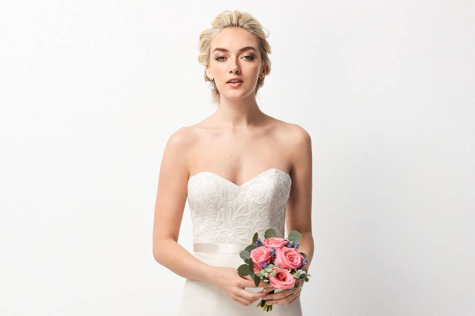 242	<br>	Modern and romantic, this flowy Bobbinet style features a sheer, high halter neckline over a sweetheart sheath silhouette. The front can be worn closed or open to show a peek of skin.