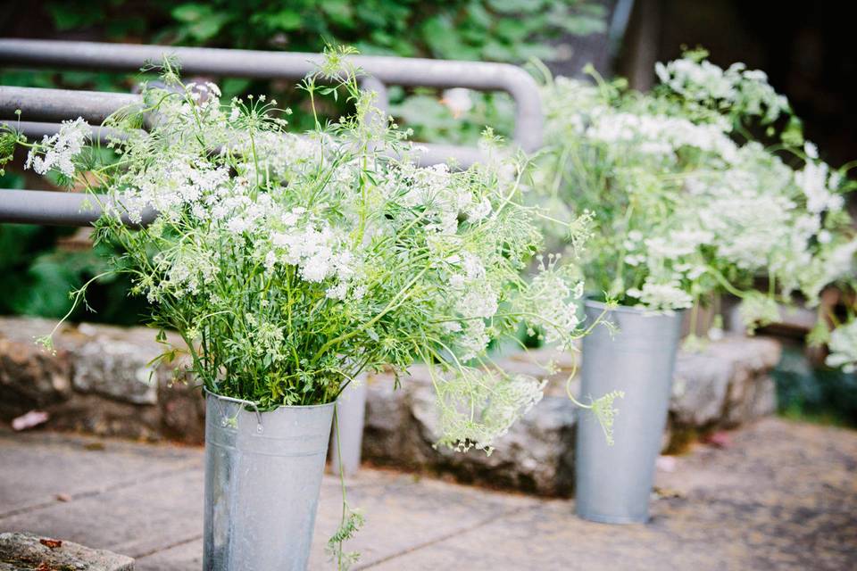 Rustic aisle flowers