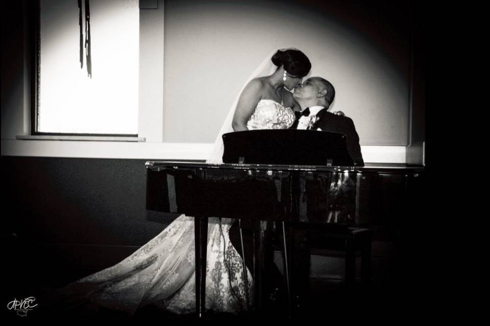 Kissing by the piano