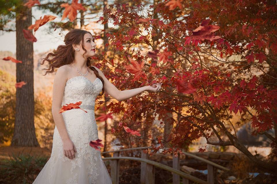 Bride posing with foliage