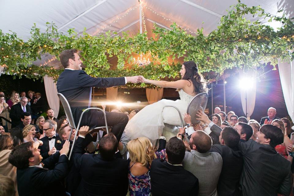 Chair dance under a tent