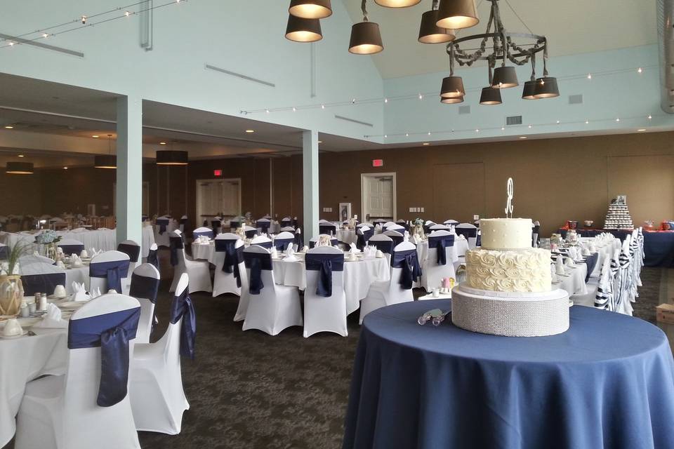 Wedding set up with specialty linens & chair covers.
