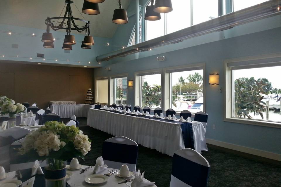 Wedding set up with specialty linens & chair covers.