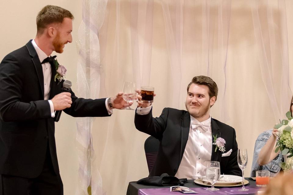 A toast at their table