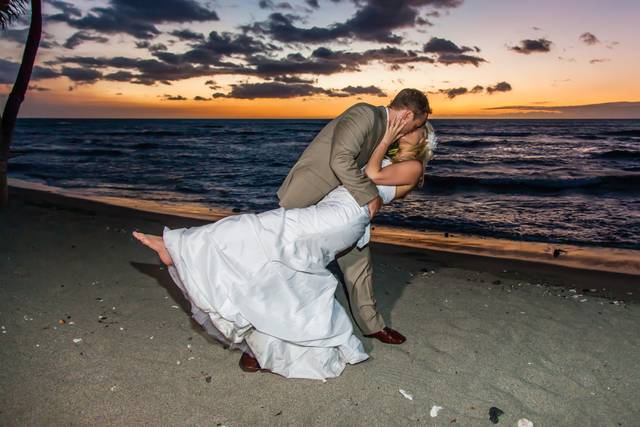 Kiss at sunset wedding