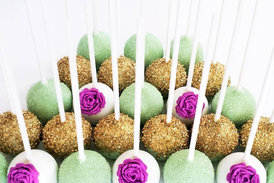 Pink, Ombre cake pop wedding cake with bride and groom cake pop toppers