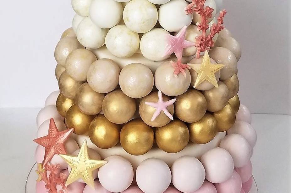 Beach-themed ombre wedding cake pop cake