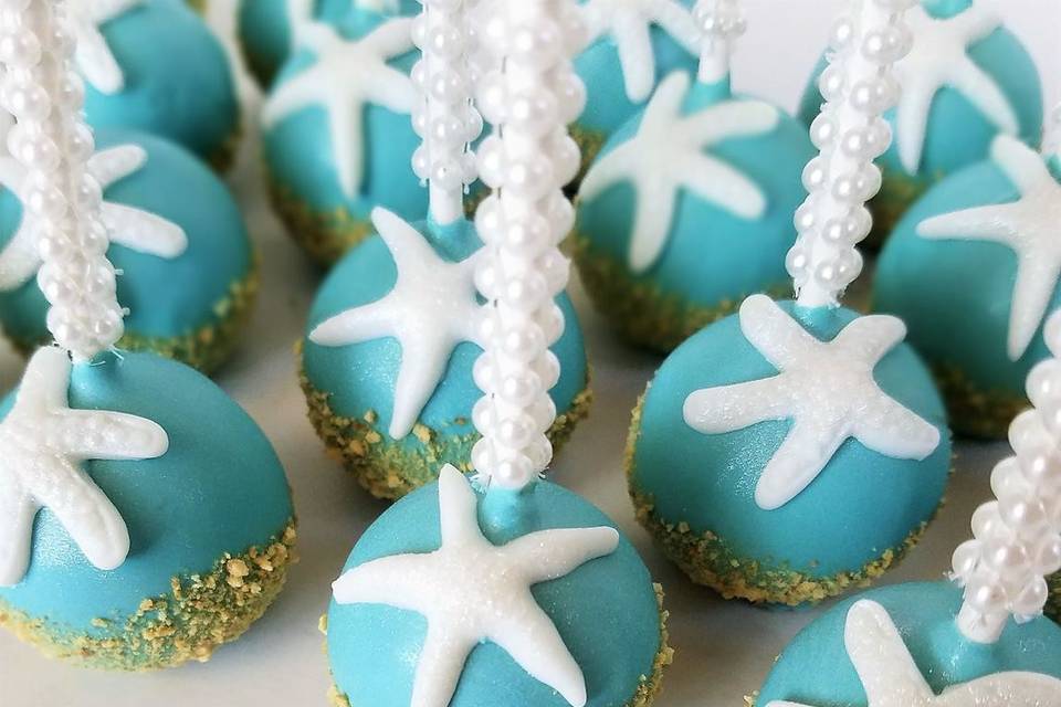 Beach-themed cake pops