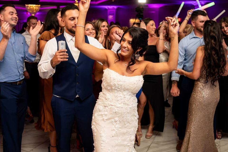 Packed dance floor bride