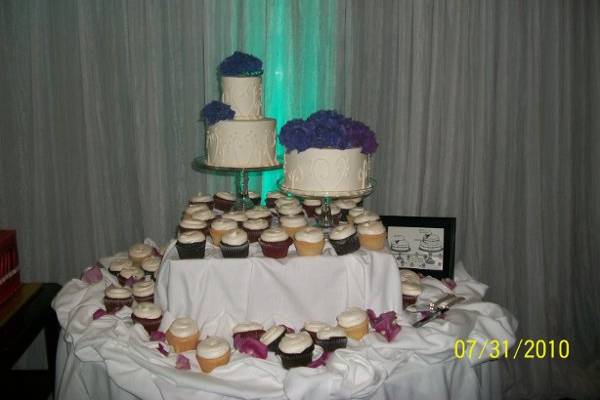 Wedding cake and cupcakes