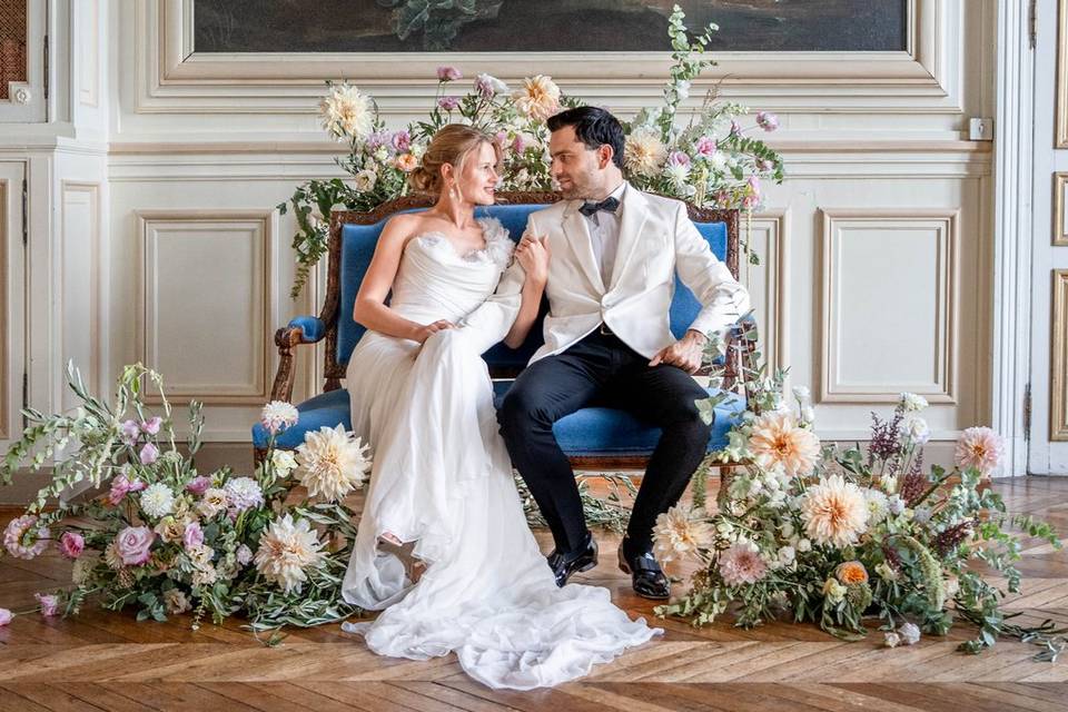 Bride and groom on settee