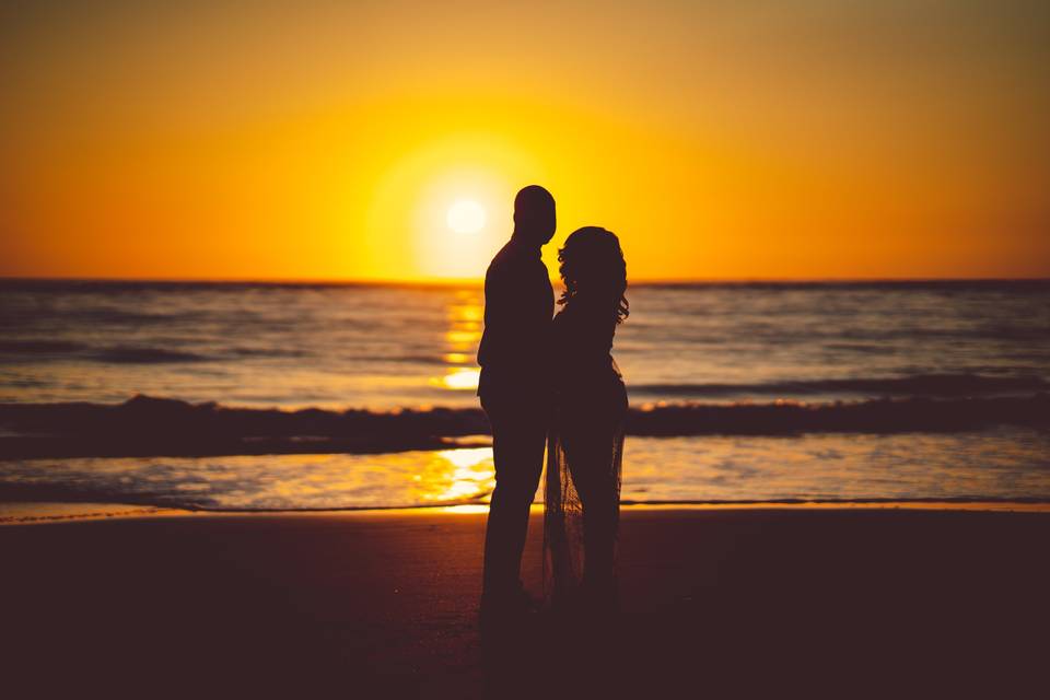 Groom and bride at the beach